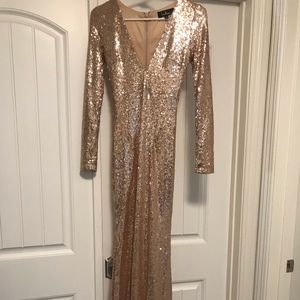 Gold sequined long sleeve gown